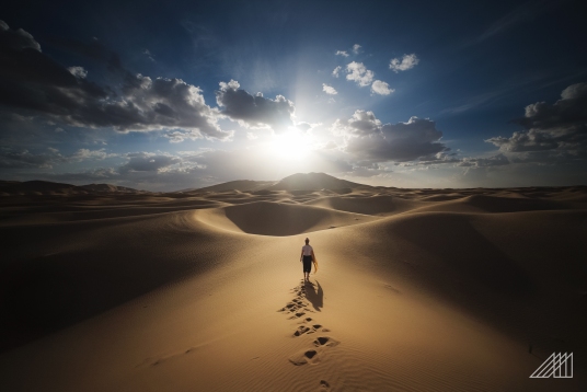 sunset walk in dune erg chebi morocco